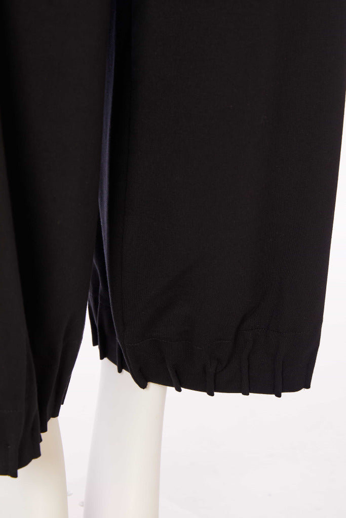 Wide leg trouser with tuck hem detail