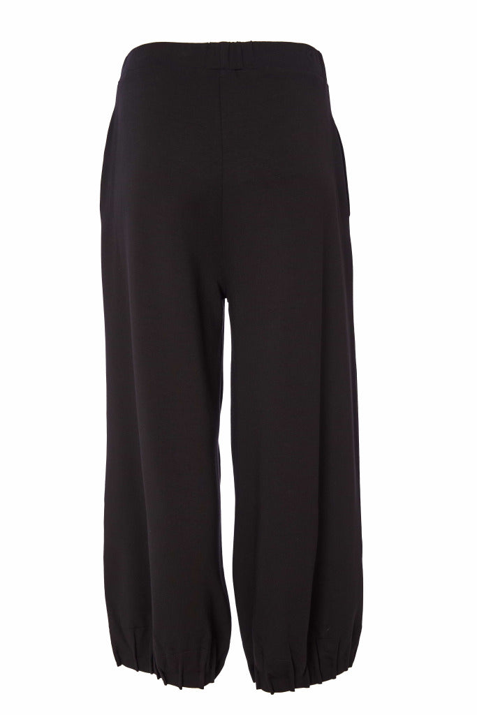 Wide leg trouser with tuck hem detail