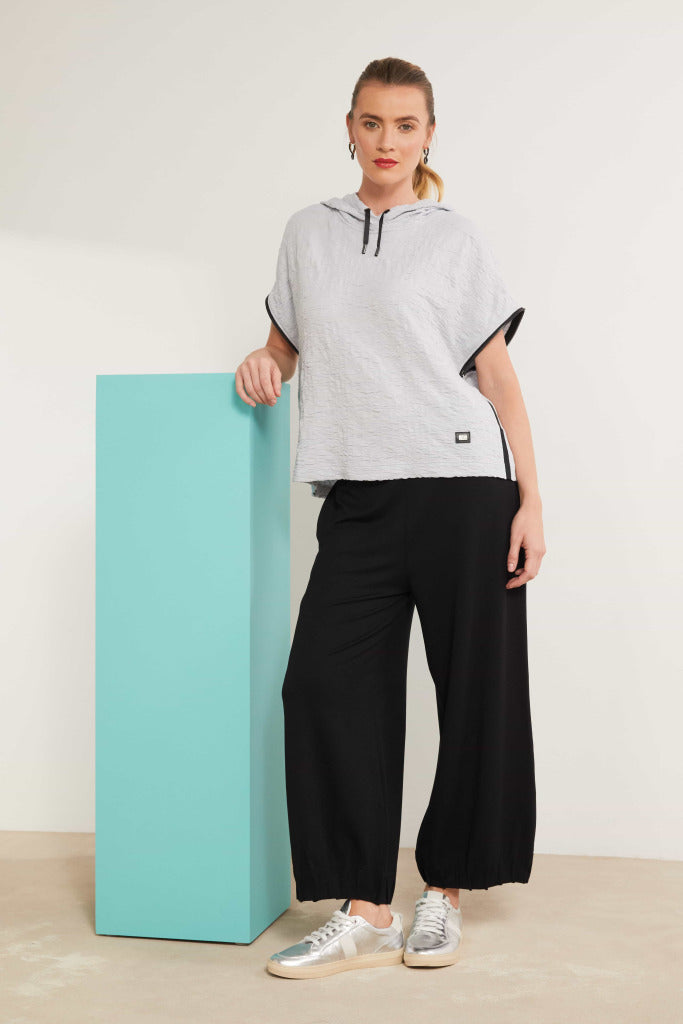 Wide leg trouser with tuck hem detail