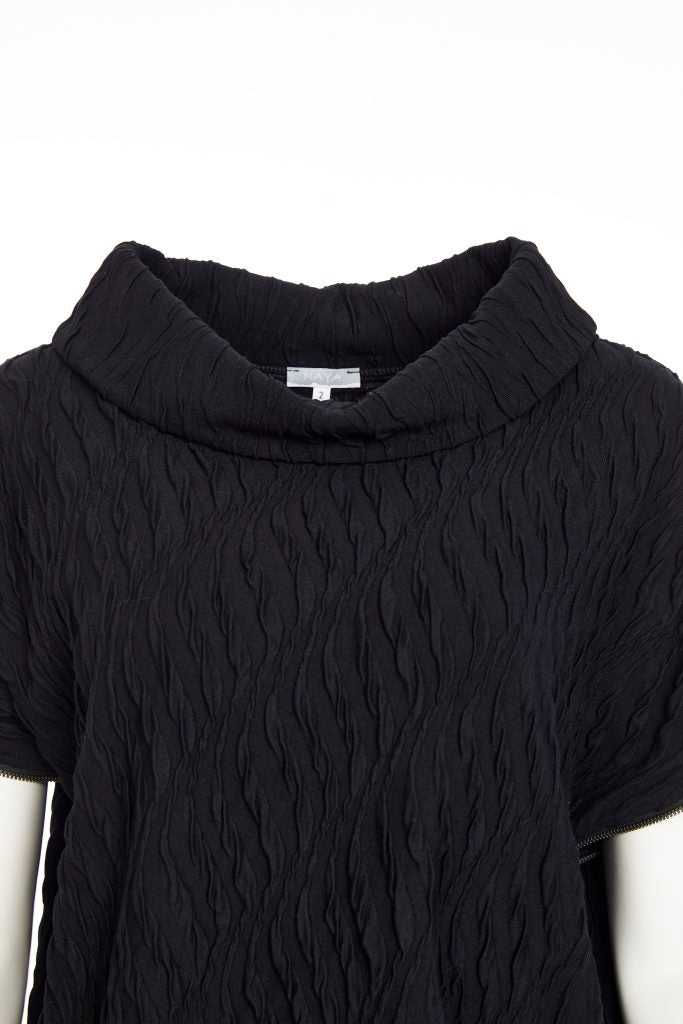 Embossed knit top with collar and zip detail on side seam Description