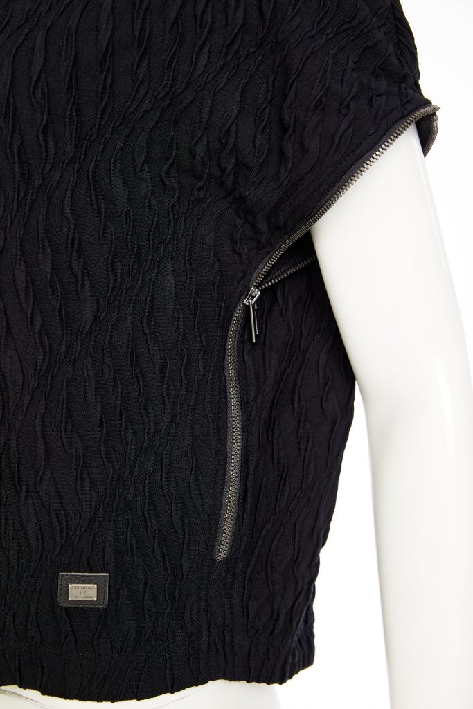 Embossed knit top with collar and zip detail on side seam Description