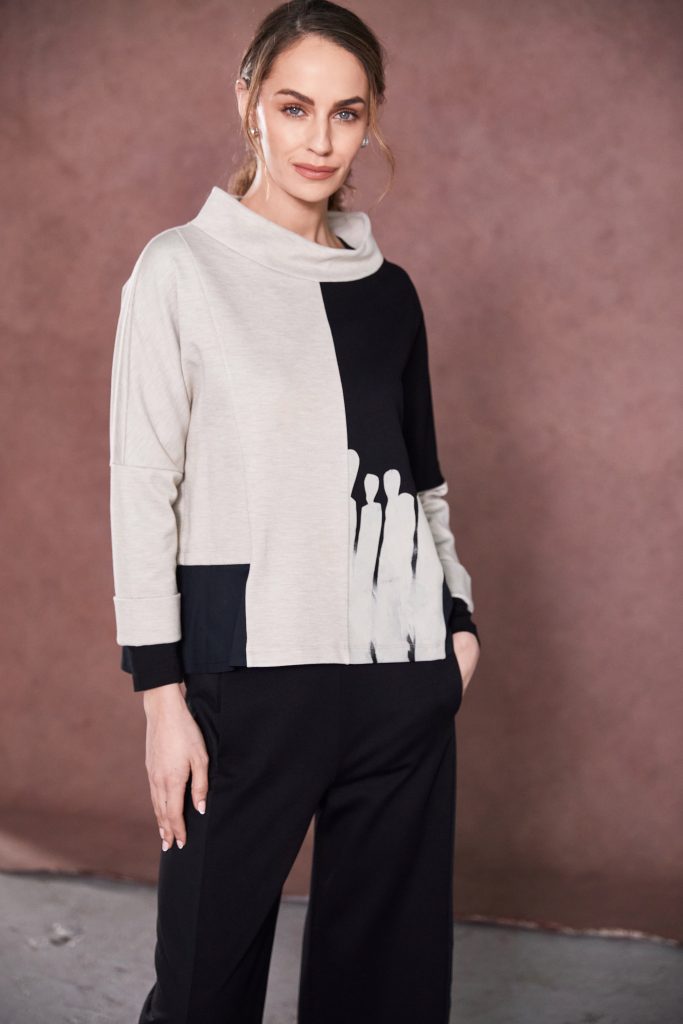 Two tone funnel neck top with placement print at front