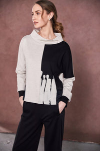 Two tone funnel neck top with placement print at front