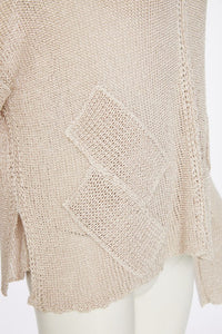 loose weave V neck knit with layed on sections