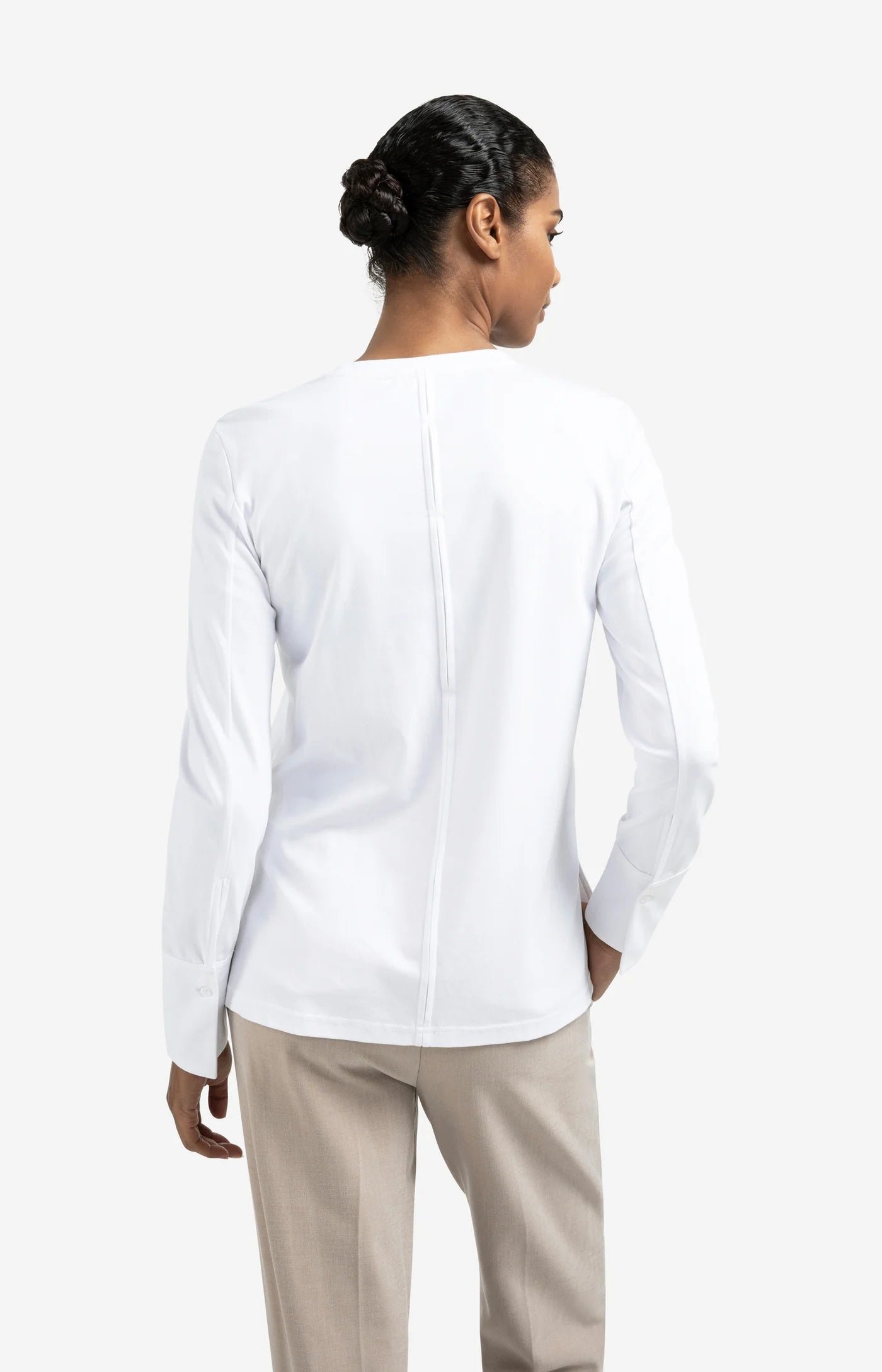 Jersey top with woven cuffs and slit detail