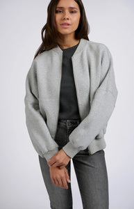 Light gray bomber jacket with long sleeves and zipper